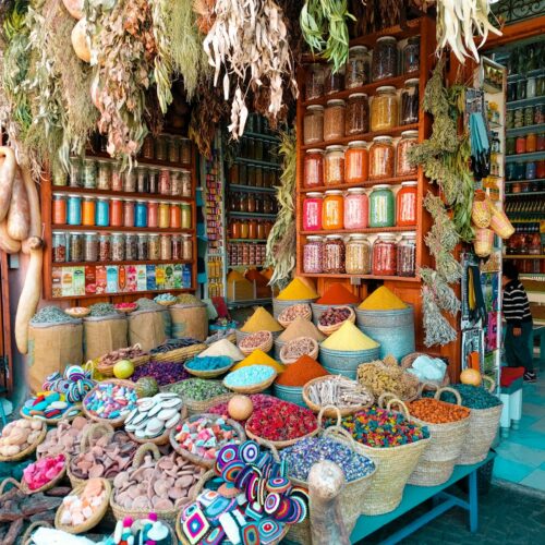 Colourful wicker baskets on display in a Marrakech souk