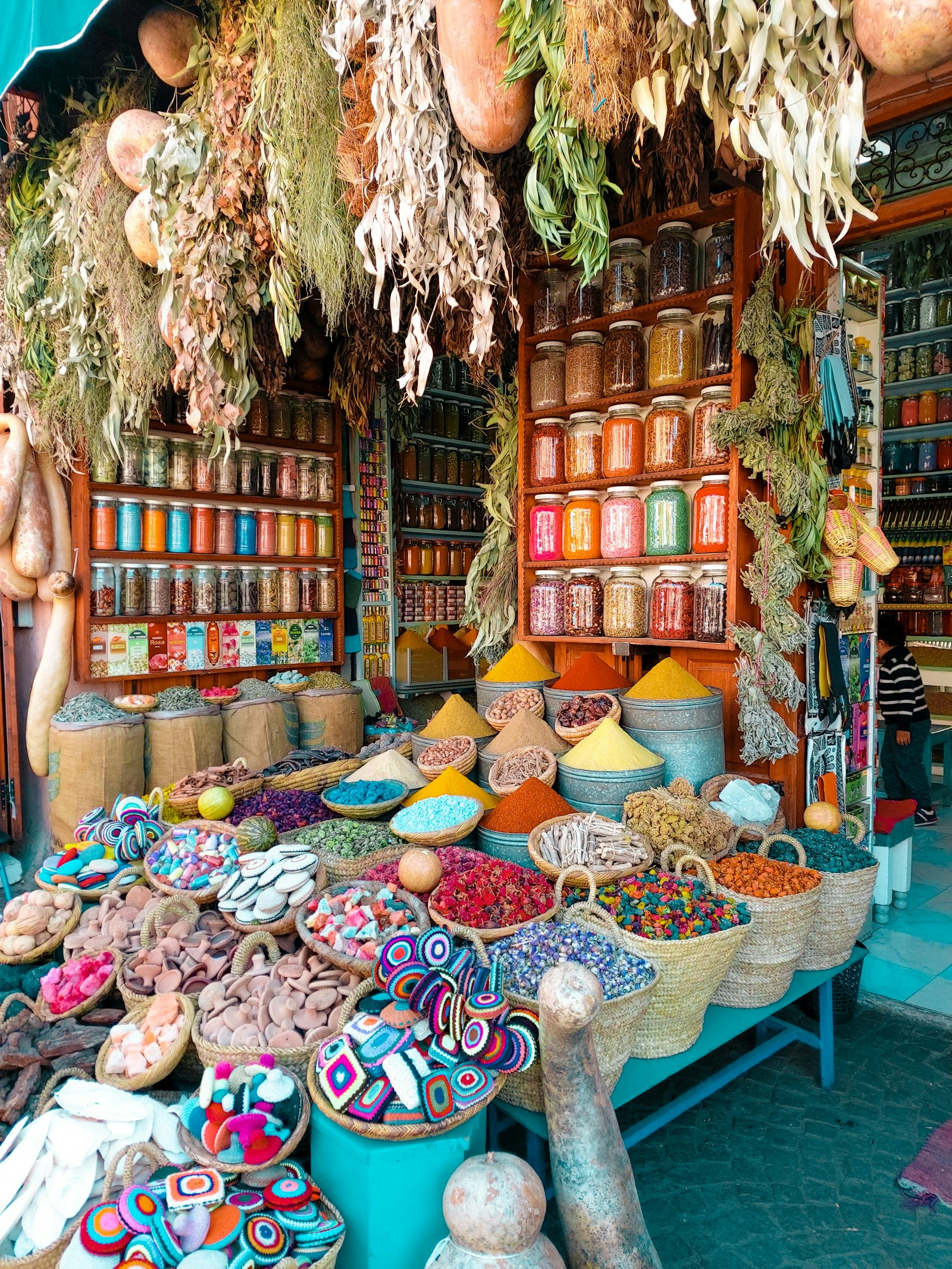 Colourful wicker baskets on display in a Marrakech souk