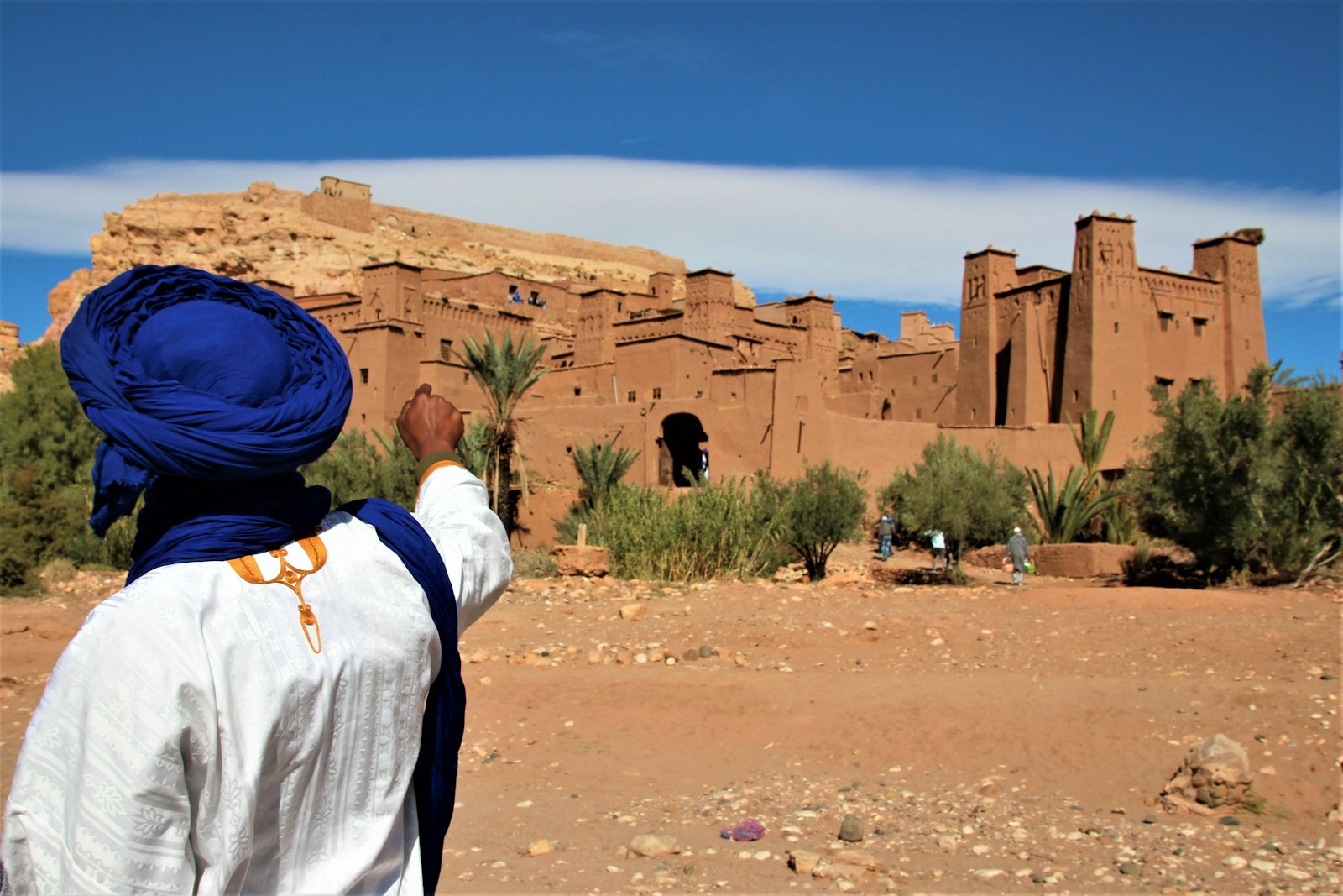 Traveller standing on desert sand near Ouarzazate, Morocco